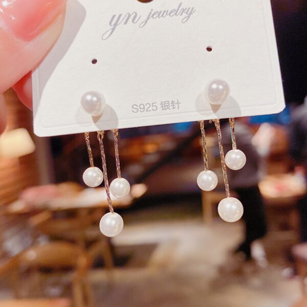 2cb95902-0a4b-41c6-9c5d-f00ce4df2c63.jpg Fashion Pearl Tassels With Two Earrings