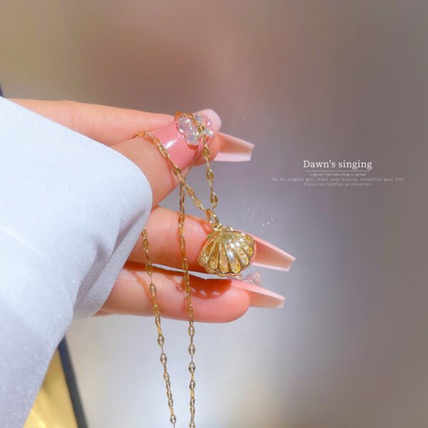 3502f926-0996-48cd-af2c-ed50cd2bea9d.jpg A Necklace Full Of Diamond Microencrusted Zircon Wisps Empty Shell Pearls