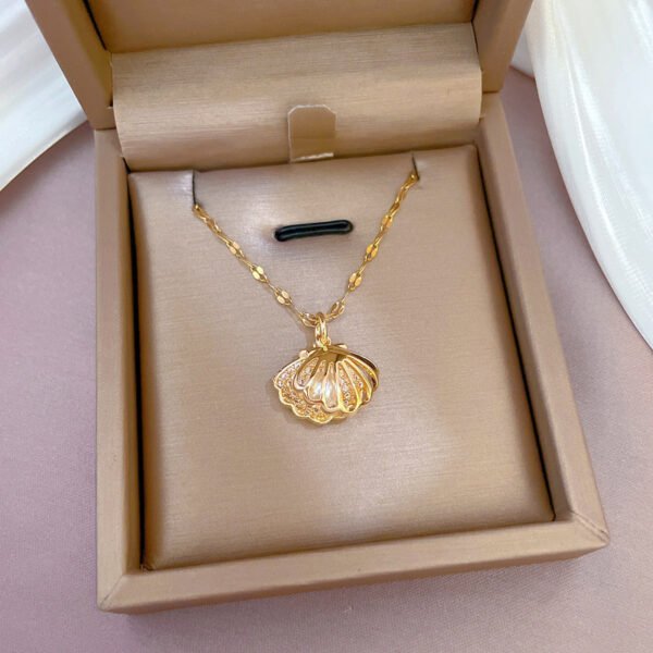 5bc04166-7541-4403-ab98-d5d97c77ea4e.jpg A Necklace Full Of Diamond Microencrusted Zircon Wisps Empty Shell Pearls