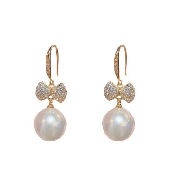 703166b5-cc38-4c69-823c-77a694786bbf.jpg Japanese And Korean Exquisite Fashion Shining Micro Inlaid Zircon Bow Pearl Ear Hook