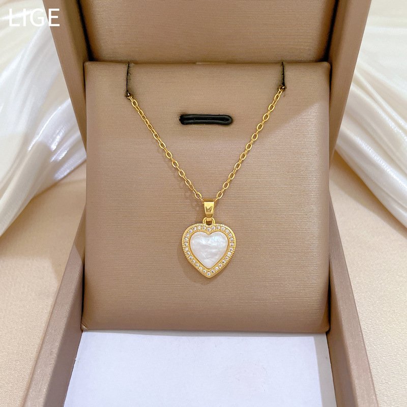 O1CN01xIWsBz2J3gXlkl5TK_2206683529366-0-cib.jpg Light Luxury Fully Jeweled Loving Heart Mermaid Graceful Personality Banquet Earrings