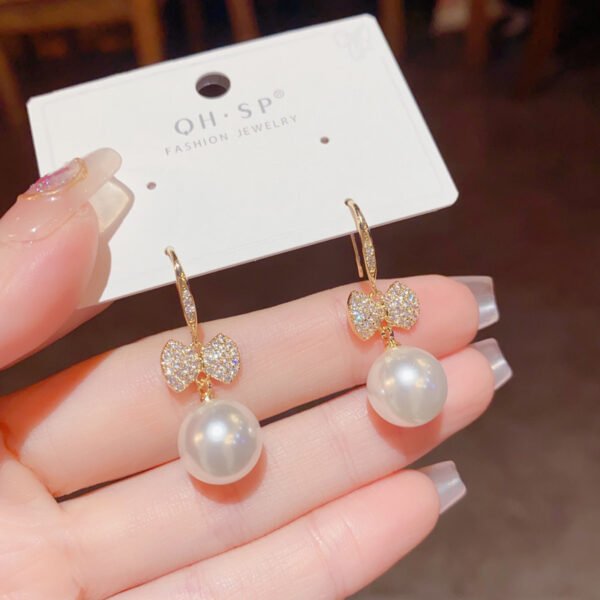 c83786a9-fb20-4196-b5a2-f0441ff2a1d1.jpg Japanese And Korean Exquisite Fashion Shining Micro Inlaid Zircon Bow Pearl Ear Hook