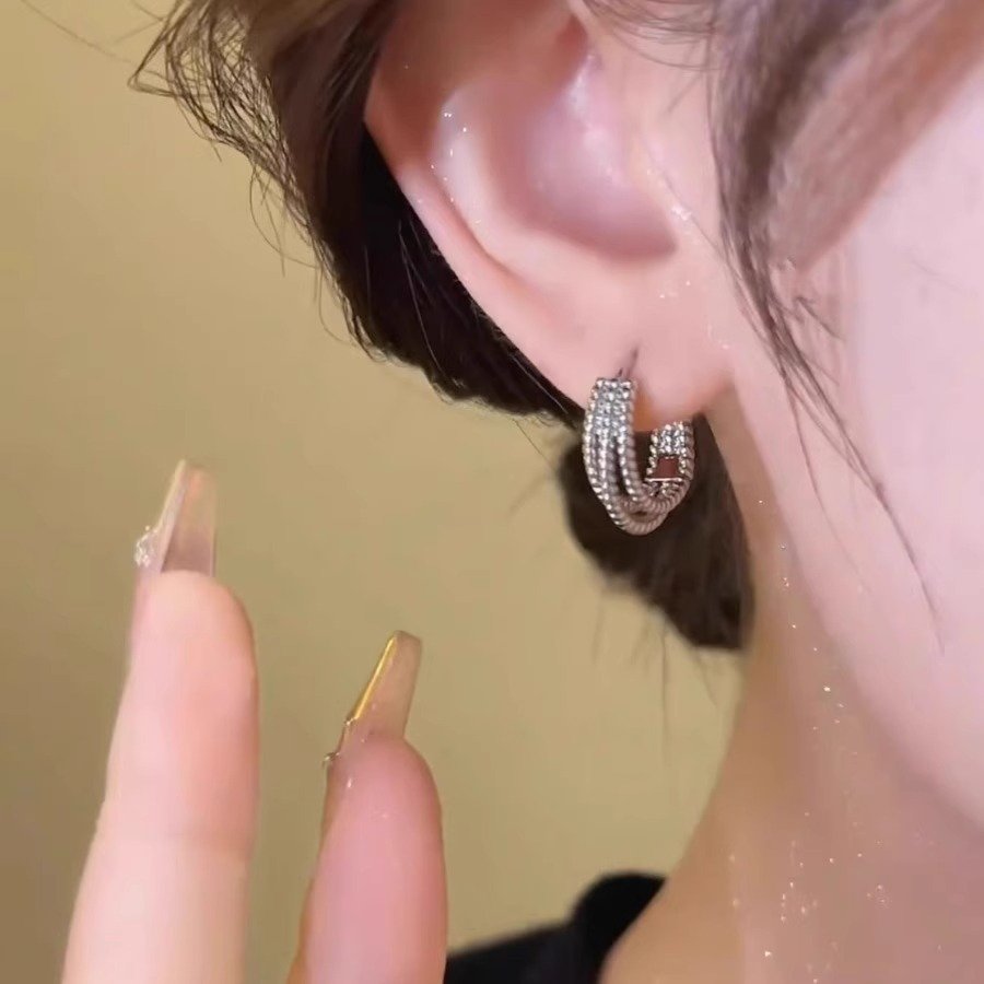 bad4d380-0d14-4284-8203-1bafcbe84e0f.jpg Niche Design Three-layer Twist Female Simple Earrings